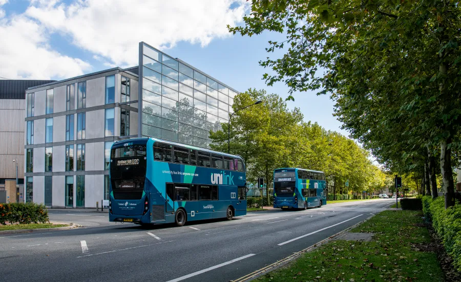 Unilink buses driving down University Road, Highfield Campus. 