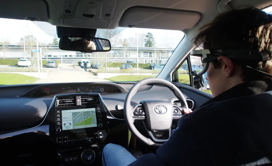 Student behind the wheel of an instrumented vehicle