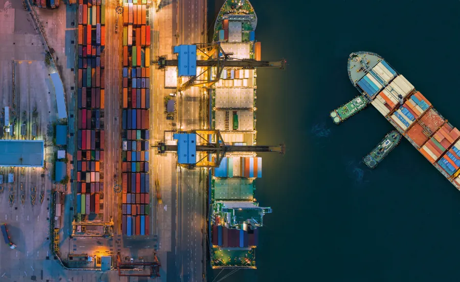 iStock aerial view of a commercial container ship in a dockyard