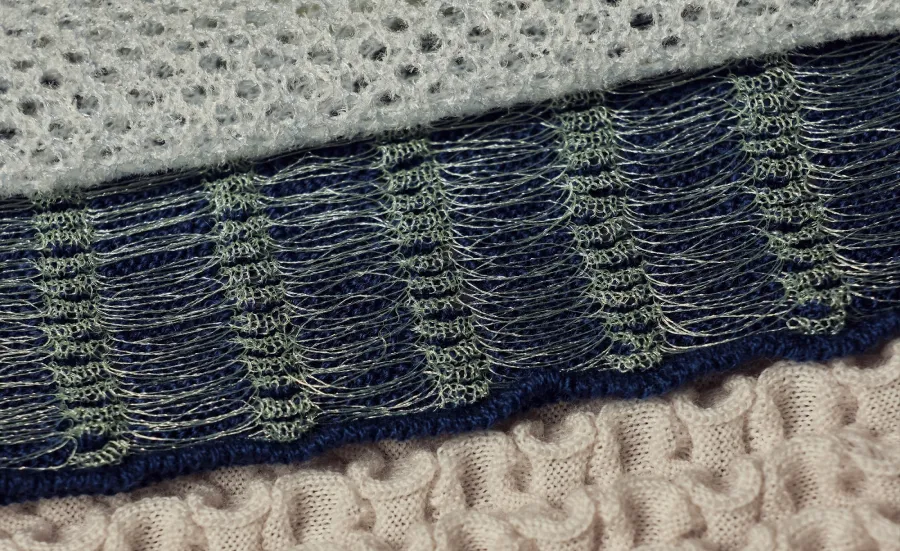 Sample of textile showing interlaced threads 