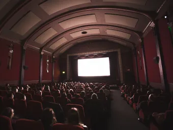 An audience watching a film