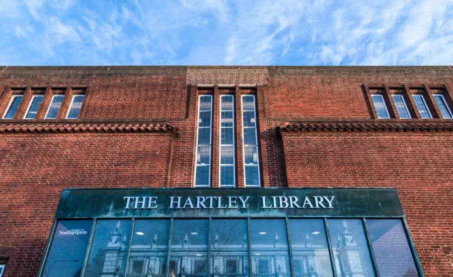 Frontage of the Hartley Library focusing on red brick detail and foyer windows